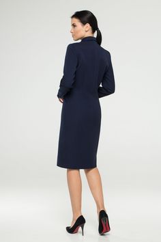 "This blazer dress would be perfect for the office or any other event that requires a more business casual dress code. - Button front fitted jacket dress - Lapel collar - Knee length (midi) - Long sleeves - With black metal buttons - Fully lined - Color: navy blue Fiber: 60% viscose, 35% polyester, 5 % elastane, lining - 95 % viscose, 5% elastane. Estimated shipping time: 10-12 business days For size S:dress length- 40,0 \" (102 cm), sleeve length 24\" (61 cm) Our model wears size S (US 6) and i Elegant V-neck Jacket Dress For Formal Occasions, Formal V-neck Midi Dress, Office Lady Bodycon Long Sleeve Dress, Elegant Long Sleeve Formal Midi Dress, Elegant Long Sleeve Midi Dress For Formal Occasions, Notch Lapel Blazer Dress With Structured Shoulders For Work, Professional Long Sleeve Business Skirt Suit, Professional Long Sleeve Skirt Suit For Business, Fitted Office Lady Dress For Fall