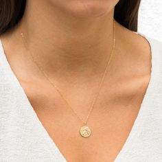 The Angel Medallion Necklace makes a gorgeous statement. It's the perfect necklace to layer with your other favorites for a night out - or wear it by itself for your morning coffee run with friends. You'll love how it adds a bit of sweetness and confidence to any outfit. DETAILS Necklace length: 18" with 2" extender 14k gold filled -or- sterling silver chain & findings 14k gold vermeil (14k gold plating over sterling silver) -or- sterling silver 15mm charm Safe for sensitive skin & shower safe Running Friends, Coffee Run, Angel Necklace, Detailed Necklace, Medallion Necklace, The Angel, Favorite Rings, Simple Necklace, Bar Necklace