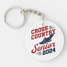 a keychain with the words cross country senior 2012 on it's side