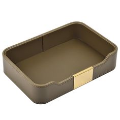 a brown leather tray with gold trimmings on the bottom and sides, in front of a white background