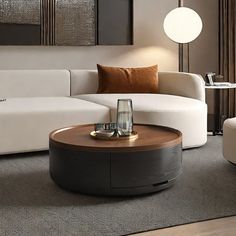 a living room with couches, tables and lamps