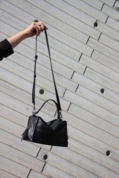 Mini Valley Cube Shoulder Bag-Black is simple and elegant, its spacious interior provides room for all the daily essentials and more, it is perfect for everyday use.This bag is made with premium full-grain Italian leather and lined with Micro Fiber, It has a full zipper closure, with an additional inner zipper pocket, it featuring an adjustable leather shoulder strap. This bag can be carried crossbody or on the shoulder.-Genuine Italian natural nappa leather-Lightweight-Long adjustable shoulder Everyday Leather Box Bag With Top Carry Handle, Modern Leather Shoulder Bag With Handle Drop, Sleek Shoulder Bag With Leather Top Handle, Sleek Top Handle Shoulder Bag With Leather Handles, Leather Box Bag With Handle Drop For Everyday Use, Black Leather Hobo Bag With Top Carry Handle, Modern Soft Leather Crossbody Satchel, Sleek Leather Shoulder Bag With Top Handle, Sleek Daily Bags With Leather Handles