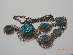 "Vintage silver or silver tone wire & blue crystal cabochons necklace. Necklace is 17\" with a 2\" dangle consisting of crystals & a lobster claw fastener. This is an estate item. All pieces are in very good condition. All parts are present and intact. This has possibly been repaired. No info available." Handmade Blue Crystal Choker Necklace, Vintage Blue Crystal Necklaces, Antique Blue Cabochon Necklace, Antique Blue Necklace With Vintage Charm, Vintage Blue Glass Necklace, Funky Necklace, Necklace Necklace, Beaded Choker Necklace, Glass Bead Necklace