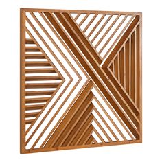 a wooden wall sculpture with lines on it