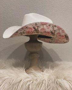 Hand made floral cow boy hat. *There are NO returns or exchanges* These items are custom made to order to the customers liking. We will be in contact throughout the process of making item. Western Hats Wedding, Cowboy Hat For Women Cow Print, Hats With Cowboy Boots, Cheap Spring Cowboy Hat, Cheap Spring Brimmed Cowboy Hat, Cheap Spring Rodeo Hats, Cowboy Hats With Matching Boots, Trendy Cowboy Hat For Country Events, Luxury Bohemian Cowboy Hat For Western-themed Events