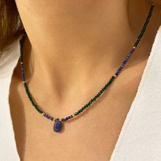 ✔️A dainty gem choker necklace that combines Genuine Sapphire gem  & Green Tourmaline tiny stones✔️  With a lapis lazuli teardrop gem  in the middle of the choker  925 Sterling Silver that is gold filled in the closure   👉 This blue & green colored necklace is great for wearing alone or for layering with other necklaces. It is the perfect gift for your girlfriend, sister, bridesmaids, or even yourself! Handmade in Greece.     Moreover, Sapphire  & Green Tourmaline are really powerful crystals t Green Stone Choker Necklace, Bead Necklace Designs, Diy Necklace Designs, Gem Stone Jewelry, Yin En Yang, Seed Bead Choker, Energy Protection, Colored Necklace, Lapis Necklace