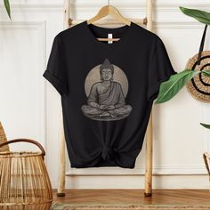 🕉️✨ **Eternal Buddha T-Shirt - Embrace Serenity with Buddhist Elegance ️ Step into a world of tranquility with our Eternal Buddha Women's T-Shirt. This intricately designed tee is more than clothing; it's a symbol of peace, mindfulness, and the eternal beauty of Buddhism. 🌸 **Artistry in Every Detail - Adorned with a beautifully screen-printed Eternal Buddha design, this shirt is a visual masterpiece that captures the essence of Buddhist serenity. 🌸 **Peaceful Comfort - Crafted with comfort i Relaxed Fit Graphic Print Tops For Meditation, Casual Graphic Print T-shirt For Meditation, Buddha Design, Eternal Beauty, Thoughtful Gifts For Her, Yoga Shirt, Yoga Tshirt, Yoga Shirts, Wife Gift