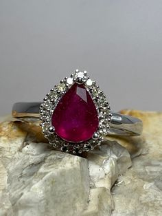 Condition excellent Full uk hallmarking 9ct gold Never worn Classic Teardrop Ruby Ring For Formal Occasions, Formal Teardrop Ruby Ring, Pear-shaped Ruby Rings, Red Pear-shaped Ruby Ring, Teardrop Halo Diamond Ring For Formal Occasions, Teardrop Ruby Ring For Anniversary, Formal Ruby Teardrop Ring, Pear-shaped Ruby Ring With Diamond Halo Setting, Pear-shaped Ruby Ring With Diamond Halo