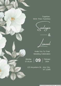 a wedding card with white flowers on it