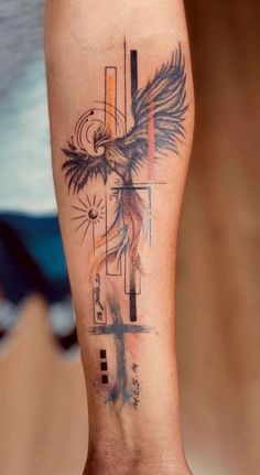 a person with a tattoo on their leg that has a cross and an eagle on it