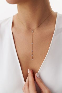 Our new elegant diamond lariat necklace. As always we craft our pieces with hand-selected natural stones and solid gold so you can admire their beauty for a lifetime.★ Necklace Features (The model in the pictures is wearing an 18k yellow gold necklace)• Gold Kt: 14K/18K Solid Gold - According to your preference (All pieces are stamped for authenticity)• Available Gold Colors: Yellow Gold, Rose Gold, White Gold• Total Diamond Weight: 0.21 carat• Diamond Color-Clarity: G Color VS2/SI1 Clarity• Dro Elegant Diamond Gemstone Drop Necklace, Elegant 14k Gold Long Drop Necklace, 14k Gold Lariat Necklace Fine Jewelry, 14k Gold Lariat Necklace For Weddings, Diamond Lariat Necklace With Long Drop For Wedding, Diamond Lariat Necklace For Wedding With Long Drop, Diamond Long Drop Lariat Necklace For Wedding, Diamond Lariat Necklace For Wedding, Wedding Fine Jewelry Lariat Necklace With Drop Shape