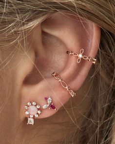 The Ejsa earrings are classy and elegant. This pair is designed to help your outfit look carefully crafted with minimal effort. Elegant Pink Sterling Silver Flower Earrings, Elegant Pink Flower Earrings In Sterling Silver, Rose Gold Ear Cuff For Party, Elegant Cartilage Earrings For Party, Elegant Pierced Ear Cuff As Gift, Elegant Pierced Ear Cuff For Gift, Elegant Sterling Silver Single Ear Cuff, Elegant Rose Gold Single Ear Climber, Elegant Sterling Silver Ear Cuff For Party