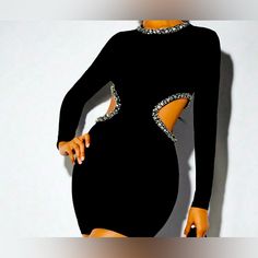 Gorgeous Date Night, Long Sleeve Black Cut Out Dress, With Decorative Rhinestones. Black Stretch Embellished Dress, Glamorous Black Bodycon Dress With Rhinestones, Black Embellished Backless Mini Dress, Embellished Black Bodycon Mini Dress, Black Embellished Bodycon Mini Dress, Black Long Sleeve Dresses With Rhinestones, Black Rhinestone Bodycon Dress, Black Embellished Bodycon Dress For Date Night, Black Bodycon Dress With Rhinestones For Night Out