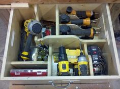 a drawer filled with tools and screwdrivers