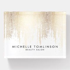 a white and gold business card with the words,'beauty salon'on it