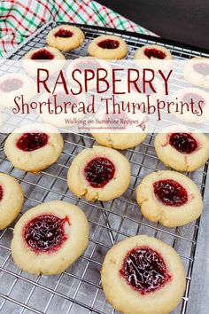 raspberry shortbread thumbprints are cooling on a wire rack with the words, raspberry shortbread thumb prints