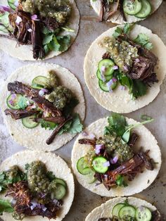 several tortillas filled with meat and veggies