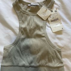 Brand New, Great Basic. More Of A Taupe Color. Basic Zara Crop Top For Summer, Zara Basic Stretch Crop Top, Zara Casual Halter Neck Top, Zara Ribbed Top, Zara Halter Top, Black Cropped Tank, Zara Crop Top, Black Crop Top Tank, Zara Basic