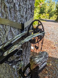 the bow stand is attached to a tree