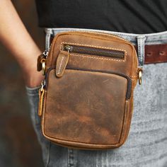 Genuine Leather Men's Shoulder Bag: Material:  🐂 Made from genuine cowhide full grain leather, ensuring durability and a classic appearance. Size:  📏 Compact yet spacious, measuring 14cm x 7cm x 18cm (5.52 inches x 2.77 inches x 7.08 inches), perfect for daily essentials without being bulky. Features: 🎒 Versatile Design:  Can be used as a shoulder bag or a waist bag, adjustable to suit different occasions. Adjustable Strap:  🔄 Shoulder strap is both adjustable and removable for customizable Leather Pouch Bag With Pockets, Casual Leather Bag With Coin Pocket, Leather Crossbody Pouch With Zipper Pocket, Brown Pouch With Pockets For Everyday Carry, Brown Leather Pouch With Pockets, Leather Travel Pouch With Pockets, Leather Pouch With Pockets For Daily Use, Outdoor Leather Belt Bag For Mobile Phone, Casual Leather Pouch For Everyday Use