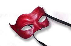 COLUMBINA MASK IN RED LEATHER This item is available to order. Please allow three weeks before shipping. Our masks are made entirely by hand, all in genuine leather and wearable. The masks are designed not only as art objects, but also to be worn. Thanks to our special process the leather retains its elasticity allowing a good fit of the mask. The leather we luse is tanned using vegetable products. The casts of which are shaped masks are in clay and its are designed and produced by us. Thanks a Comedy Theater, Leather Cosplay, Joker Mask, Pagan Magic, Mask Shapes, Theatre Costumes, Costume Mask, Burning Man, Larp