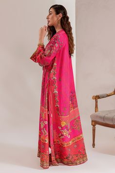 Maria B Pakistani Eid Dress in Raw Silk Kameez Trouser Style is an embroidered masterpiece that will give you a traditional and glamorous look on the festive occasion. Lavish designs, floral motifs, and hand-worked embellishments enhance the charm of this Pakistani Party Dress. Detailed Description: SKU: PS1823 Detailing: Embroidery, Threads, Floral designs, Motifs, Sequins, Beads Color: Hot pink Fabric: Raw Silk Design: Fully Embroidered dress Event: Festive, Party wear Festive Embroidered Dress With Dupatta In Maxi Length, Festive Embroidered Maxi Dress With Dupatta, Pink Cambric Traditional Wear, Unstitched Embroidered Dress With Dupatta For Eid, Spring Bollywood Dresses With Dabka Work, Pink Traditional Wear With Dabka Work In Cambric, Pink Anarkali Traditional Wear In Cambric, Pink Zari Work Dress For Traditional Ceremonies, Traditional Pink Cambric Kurta