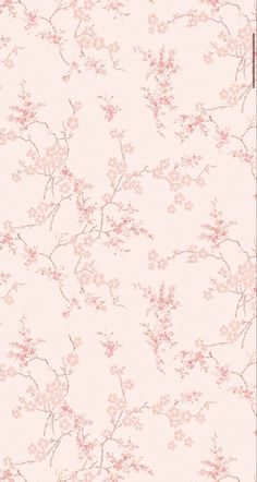 a wallpaper with pink flowers and branches in the background, on a white surface