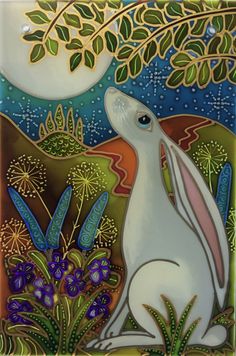 a glass tile with a white rabbit sitting in the grass and flowers on it's side