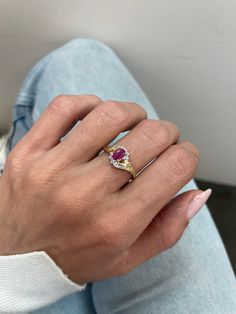 Vintage Ruby Ring, 0.60 CT Oval Shape Natural Ruby, 10k Yellow Gold, Estate jewelry, bypass shank, pink ruby ring, oval ring, ruby jewelry Jewelry Material: Yellow Gold 10k (the gold has been tested by a professional) Total Carat Weight: 0.66ct (Approx.) Total Metal Weight: 2.55g Size: 8 US  Grading Results: Stone Type: Ruby Shape: Oval Carat: 0.6ct (Approx.),Stones quantity:1 Color: Red-Pink Grading Results: Stone Type: Diamonds Shape: Round Carat: 0.06ct (Approx.),Stones quantity:12 Color: H C Oval Lab-created Ruby Diamond Promise Ring, Oval Lab-created Ruby Promise Ring, Oval Brilliant Cut Ruby Promise Ring, Oval Ruby Ring For Proposal, Oval Ruby Ring With Prong Setting For Proposal, Oval Gold Ruby Ring For Proposal, Vintage Ruby Ring, Ruby Ring Vintage, Ring Ruby