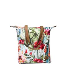 This carry-all tote features a fun cactus floral print and is just the right size to transport a few daily essentials. Simple zippered top keeps them all enclosed. \r\n\r\nZippered top\r\nCotton\r\nMeasures: 15 1/2 x 6 x 16 1/2\r\nTall Tote Cactus Floral | Women's Tall Tote Cactus Floral in Multi Cotton, Size: OS by Ariat Casual Floral Print Shoulder Bag For Daily Use, Casual Travel Bag With Floral Print, Casual Floral Print Travel Bag, Casual Canvas Bag With Floral Print, Casual Multicolor Floral Print Bag, Casual Multicolor Floral Print Shoulder Bag, Casual Reversible Bags For Spring, Casual Reversible Spring Bags, Casual Floral Print Bags For Vacation