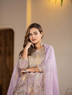 This 3-piece set includes purple cotton floral print & embroidered a line kurta, regular shape kurta has round neck, 3/4th sleeves, flared hem, above knee length teamed with cotton dhoti pants has elasticated waistband & slip on closure and a voile dupatta. The model wearing the size small is 5'8 in height. 3 Piece Set Color-Purple Kurta Fabric- Cotton Bottom Fabric - Cotton Dupatta Fabric-Voile Work - Floral Print & Embroidery detailing Neck - Round Neck Sleeves - 3/4th Sleeves Length-Above Kne Unstitched Chandbali Sets For Eid, Lavender Anarkali Semi-stitched Sets, Purple Straight Kurta For Wedding, Festive Lavender Semi-stitched Salwar Kameez, Lavender Semi-stitched Dress For Eid, Lavender Sets With Dupatta For Eid, Lavender Eid Outfit Set With Dupatta, Lavender Eid Sets With Dupatta, Lavender Eid Set With Dupatta