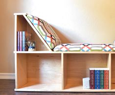 a book shelf with books on it and the words how to build an awesome reading nook