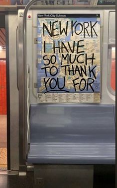 a subway car with graffiti written on the door and in writing that says new york i have so much to thank you for