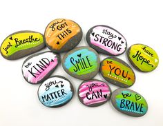 rocks with words painted on them that say, perfect for hiding or gifting?