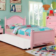 a child's bedroom with blue walls and pink furniture