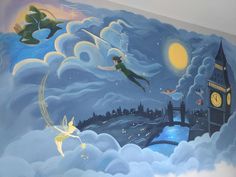 a mural on the wall of a children's room with fairy tale scenes painted on it