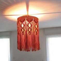 a red chandelier hanging from the ceiling