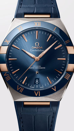 Featuring a polished blue ceramic bezel, a sun-brushed blue dial, and a date window at the 6 o'clock position. Luxury Bags Collection, Omega Constellation, Leather Strap Watch, Blue Ceramics, Mixed Metals, O Clock, Omega Watch, Constellations, Luxury Bags