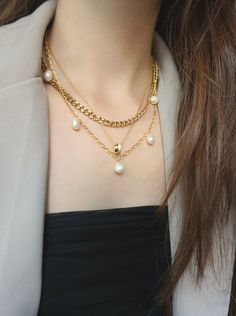 Simplicity at its finest. This slim curb chain is made to worn everyday with your favorite outfit. Wear it alone or layer it with your other necklaces. 18K Gold Plated; Stainless Steel Length: 18 inches ; Chain Width: 5mm Trendy Pearl Chain Necklace For Layering, Dainty Curb Chain Jewelry For Layering, Trendy Layered Necklace With Pearl Chain, Elegant Jewelry With Curb Chain For Layering, Elegant Curb Chain Jewelry For Layering, Elegant Gold Charm Necklace With Curb Chain, Classic Curb Chain Necklace For Layering, Elegant Gold Plated Charm Necklace With Curb Chain, Elegant Gold-plated Charm Necklace With Curb Chain