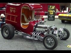 an antique car is on display at a show