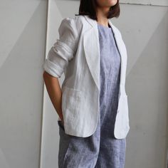 White Linen Outerwear With Pockets, Fitted Single-breasted Summer Outerwear, White Lapel Collar Summer Outerwear, White Lapel Collar Outerwear For Summer, White Summer Outerwear With Lapel Collar, Summer Blazer With Pockets And Lapel Collar, Spring White Relaxed Fit Blazer, Spring White Blazer With Relaxed Fit, Summer Fitted Blazer With Pockets