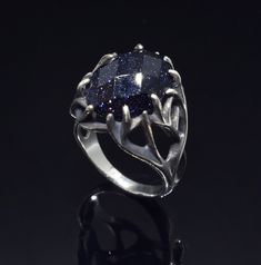 Galaxy Blue Sandstone Nebula Ring, Goldstone Silver Ring, Anniversary Gift For Her. ArmenianJewelryHouse personnel do everything to complete the customer's safety and experience.  Item Details  - Material: 925 Sterling Silver - Weight ~ 9.00 Grams(Depending on size) - Gemstone: Blue Sandstone - Gender: Female - Finish: Polished Silver / Oxidized Silver - The product is handmade and its weight may vary up to 1.00 grams. - We recommend using the main photo version of the item(If there are any othe Nebula Ring, Space Rings, Galaxy Ring, Blue Sandstone, Polish Silver, Anniversary Gift For Her, Oxidized Silver, Armenia, Rings Statement