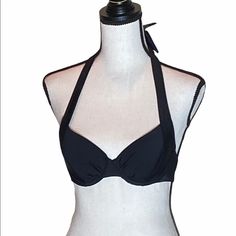 Adore Me Black Halter Bikini Top In Size 32b Elegant Black Halter Top For Beach, Black Underwire Swimwear Partially Lined, Adjustable Black Halter Top For Swimming, Fitted Black Halter Top For Pool, Elegant Black Halter Top For Poolside, Black Halter Neck Swimwear With Padded Cups, Fitted Black Padded Swimwear, Summer Black Partially Lined Swimwear, Black Underwire Halter Top For Pool