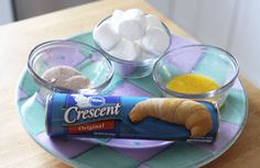 the ingredients for this breakfast include marshmallows, croissant and orange juice