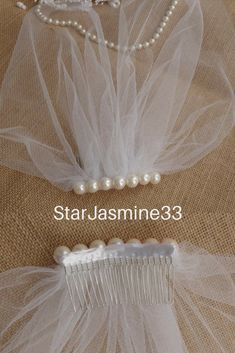 Veil Ivory Tulle Birdcage Veil Vintage Style Petite Veil Mini Illusion Tulle Veil Pearls Birdcage Veil Vintage Style Veil Mini BlusherElegant and subtle bridal illusion mini veil. Measures 10 inches ( 25 cm);12 inches (30cm);14 inches(36cm) #wedding #veil #tulle White Tulle Veil For Bridal Shower, Elegant Wedding Veil Made Of Net, Elegant Tulle Veil For Bridal Shower, Elegant Tulle Bridal Accessories For Bride, Elegant Tulle Bridal Accessories For Bridal Shower, Elegant Bridal Accessories In Tulle, Elegant Cream Tulle Veil, Elegant Wedding Veil In Net, Elegant Wedding Veil In Net Material