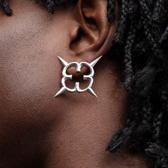 Juanita Care is an independent avant-garde jewelry and vegan accessories born in France, 2017. Punk aesthetic meets artistic freedom, a fusion of fear, desire, revolt, and seduction. Each piece embodies the poetry of evolving bodies. Welcome to a realm where expression knows no bounds. Earrings inspired by ceramic handles from the Moche culture of Ancient Peru. Material: Sterling silver, polished finish, sculpture design, chain keeps in pendant. Dimensions: Length (open) 70cm, Width 3cm. Edgy Metal Festival Earrings, Festival Edgy Earrings For Pierced Ears, Single Metal Earring For Streetwear, Punk Pierced Earrings For Streetwear, Punk Style Pierced Earrings For Streetwear, Silver Punk Single Earring, Silver Punk Style Single Earring, Single Silver Punk Earring, Edgy Silver Earrings For Festival