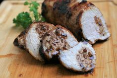 some meat is sitting on a cutting board