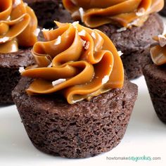 chocolate cupcakes with caramel frosting on top