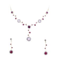 PRICES MAY VARY. Materials: Rhinestone crystals Color: Clear, pink, rose opal, fuchsia Type: Necklace Earrings Set Alloy metal: Silver-tone Size: Necklace: Center part 1.75" x 0.75" wide. Chain is 16.5"--18.5" in length. Earrings: pierced style(posts are made with sterling silver, safe for Sensitive Ears. If the posts bent Please adjust it straight back and that will be fine.) 1.5" long and 0.4" wide. Up for sale is this gorgeous necklace and earrings with sparkling rhinestone crystals. Good for Elegant Pink Rhinestone Jewelry Set, Formal Pink Crystal Jewelry Sets, Pink Crystal Jewelry Sets For Formal Occasions, Formal Pink Necklaces With Matching Earrings, Elegant Pink Crystal Jewelry Sets, Pink Crystal Jewelry Sets With Rhinestones, Pink Sparkling Stones Jewelry Set For Party, Pink Rhinestone Jewelry Set For Party, Pink Party Jewelry Sets With Sparkling Stones