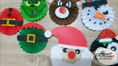 paper plates with santa hats and other decorations